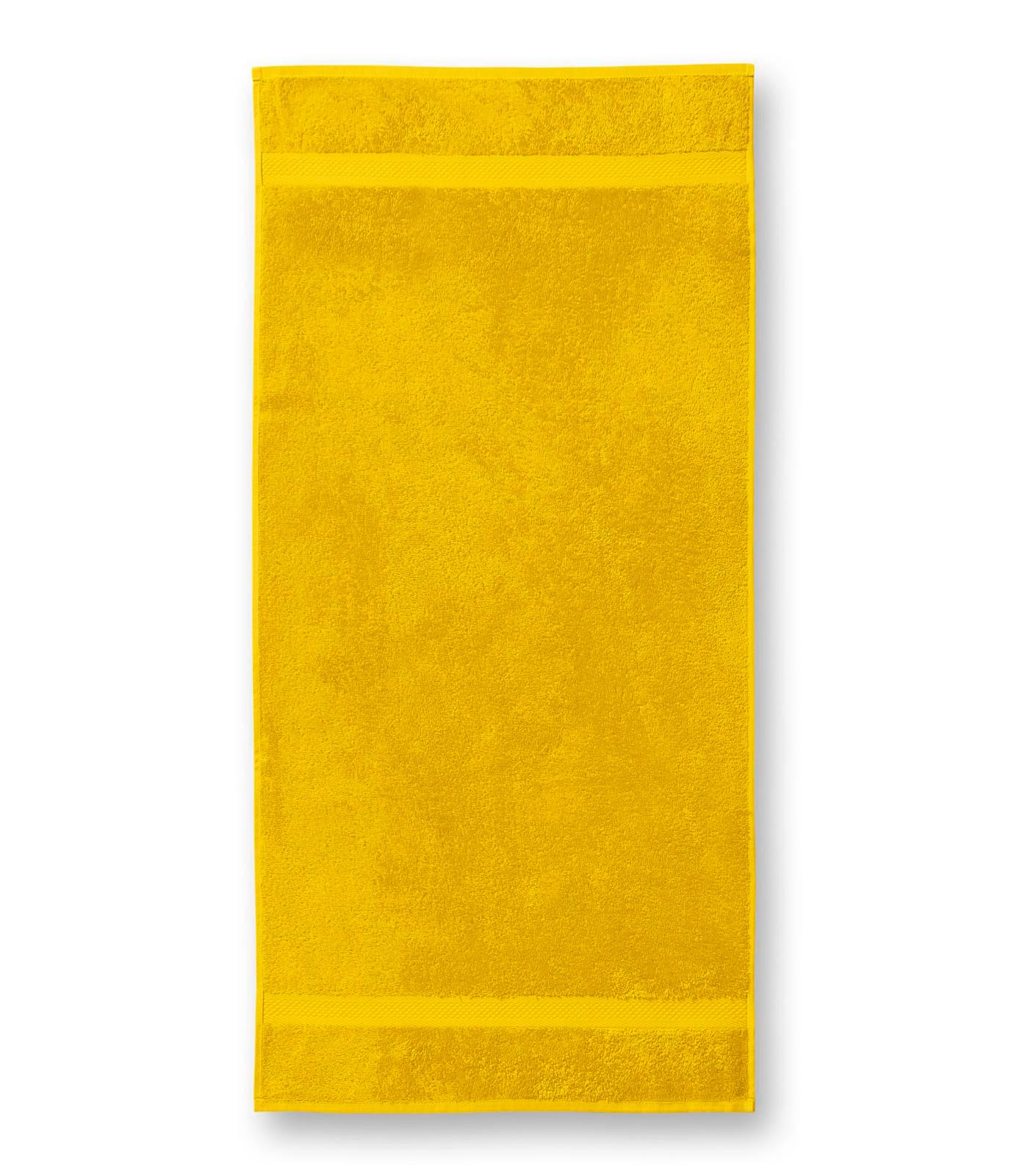Terija cilpiņu auduma dvielis. Izmēr 50 x 100 cm. Dzeltenā krāsā ar bodņu abos galos.